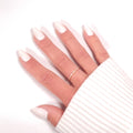 Press-on Nails Blanc Crème portés sur main — forme amande courte, manucure épurée et lumineuse LYLY Nails