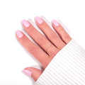Manucure Press-on Nails Rose Bonbon — forme arrondie courte, teinte vive et joyeuse gros plan LYLY Nails